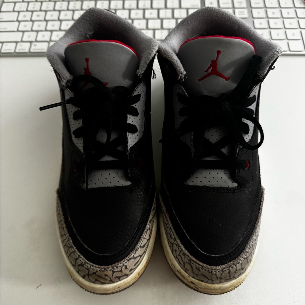 Jordan Black and White Sneakers with Red Accents